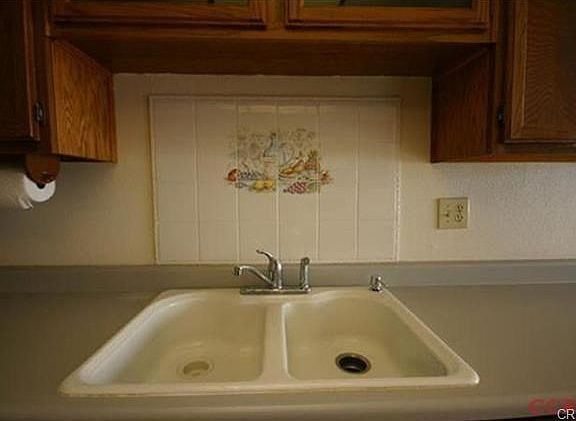 Kitchen upgrades also include a beautiful tiled back splash and