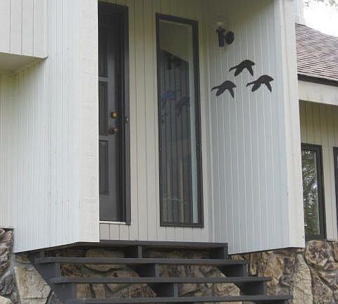 A long driveway features a private entrance to this great home.