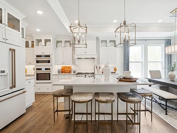 Kitchen with upper glass cabinetry