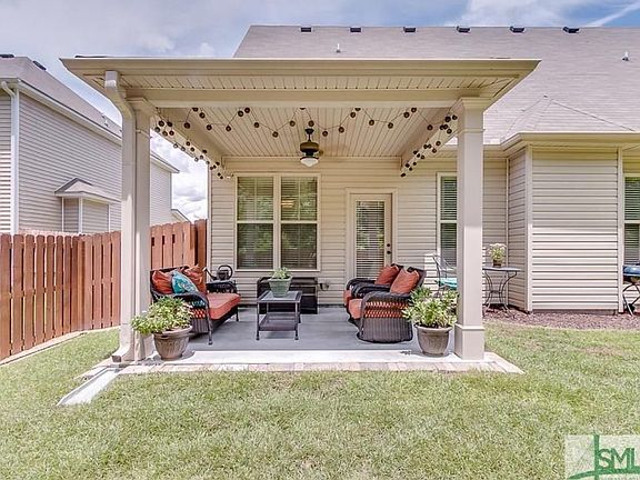 Enjoy refreshments on the patio with friends.