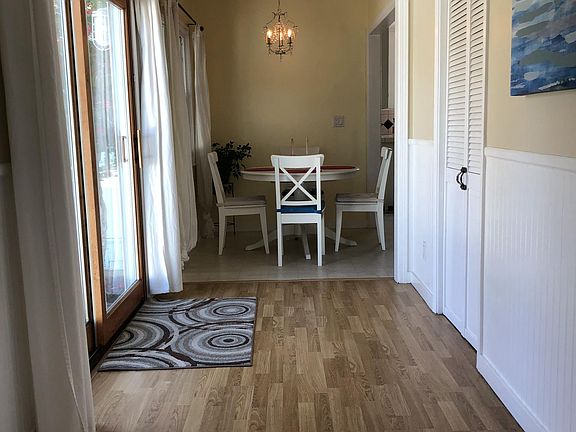 Hallway and dining area/ entrance to backyard