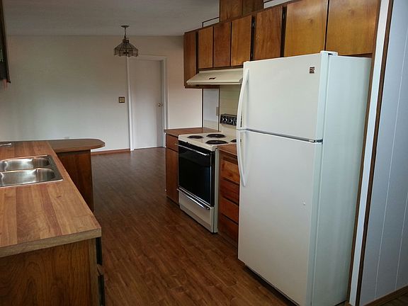 kitchen with new refrigerato