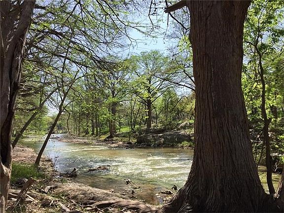 Cypress Creek flowing to Blanco River at the end of the picture