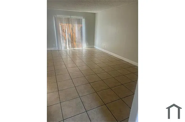 Building Photo - 3375 Avenue J #3