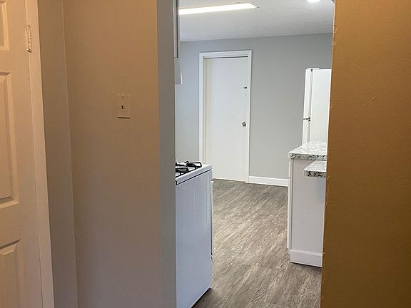 Landing at top of stairs; bathroom is to the left. Kitchen is straight ahead.