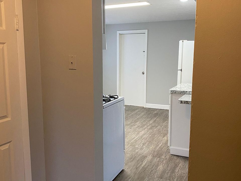 Landing at top of stairs; bathroom is to the left. Kitchen is straight ahead.