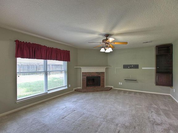 THIS IS A GREAT OPEN  ROOM WITH PLENTY OF SPACE FOR ALL YOUR FURNITURE.