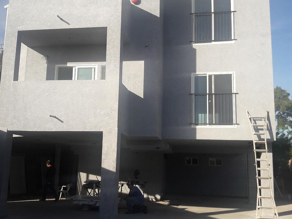 Seven-unit building, no elevator, apartment is on the second floor; one off-street parking space.