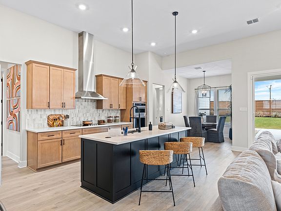 The kitchen has a convenient island.