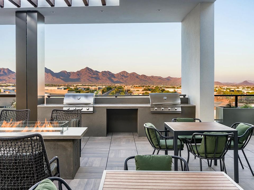 Grill, gather, and unwind with sweeping mountain views as your backdrop_this rooftop oasis is perfect for golden hour cookouts and cozy firepit conversations.