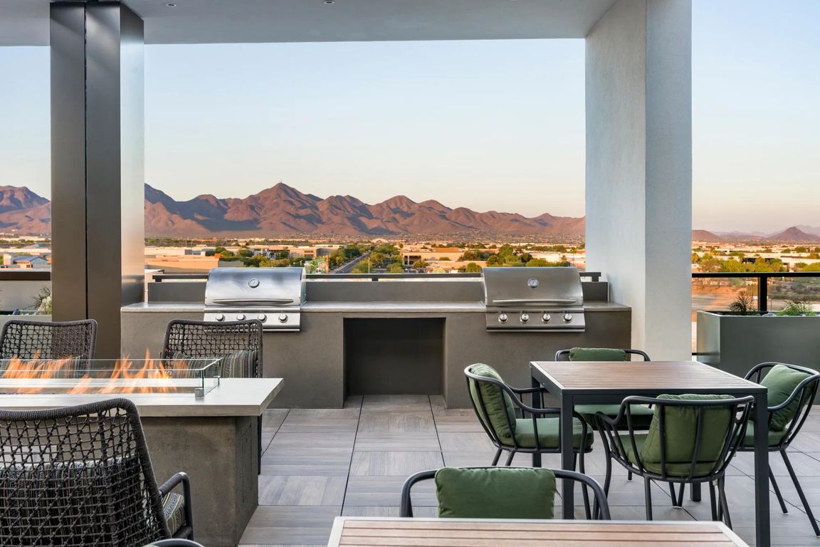 Grill, gather, and unwind with sweeping mountain views as your backdrop_this rooftop oasis is perfect for golden hour cookouts and cozy firepit conversations.