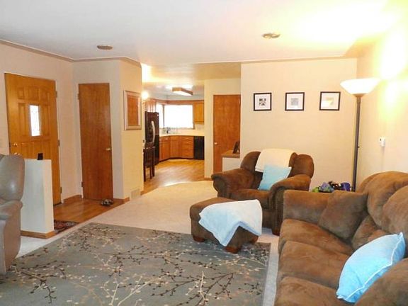 The floor plan opens up between the kitchen and living room.