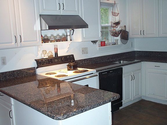 granite kitchen/porcelain floor