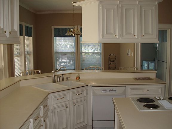 Corian counter and snack bar seats 10.