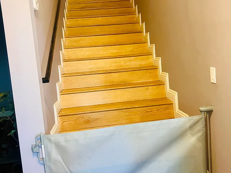 Stairs have a closable screen at the top & bottom