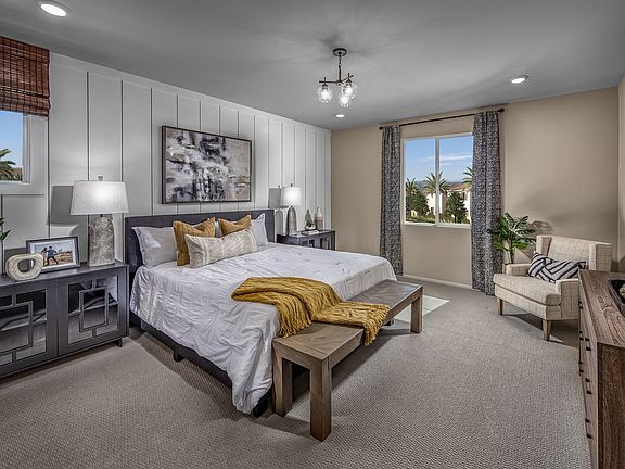 Residence 4 primary suite modeled at a nearby Meritage community.