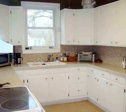 Well-lit kitchen with updated hardware