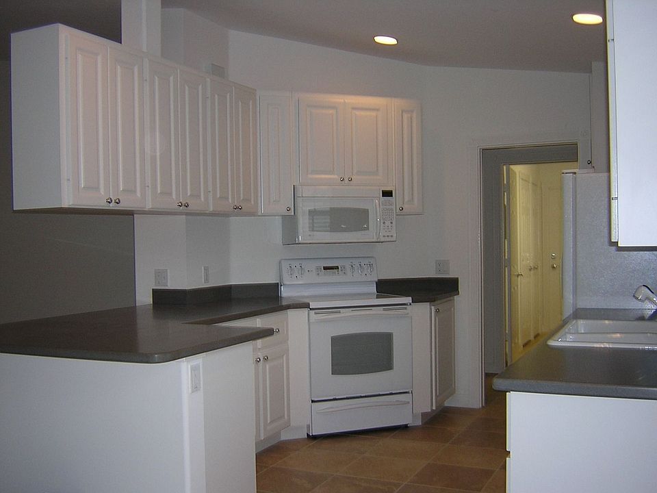 Corian counters, oversized tile floor