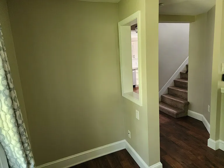 Nook area showing foyer and stair to 2nd floor