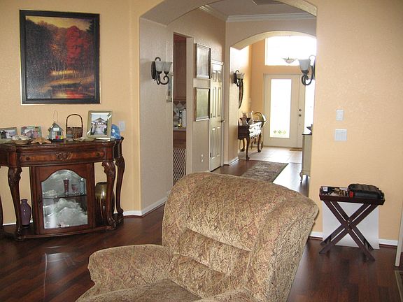 Dark wood flooring and upgraded carpet. 