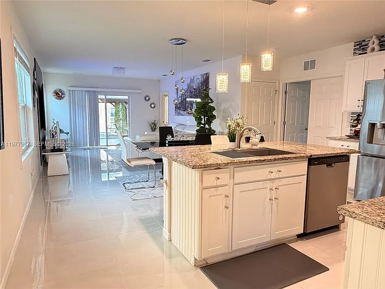 12422 SW Rimini Way — Photo 3