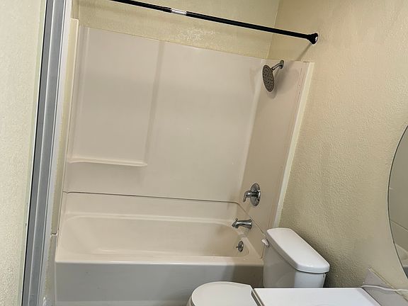Bathroom full bath and shower and sink and toilet