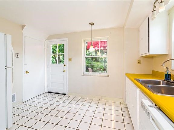 Kitchen exits to rear patio.