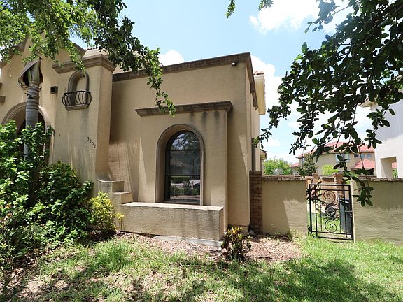 Beautiful Mediterranean Style Home with Stucco and Spanish Tile Roof