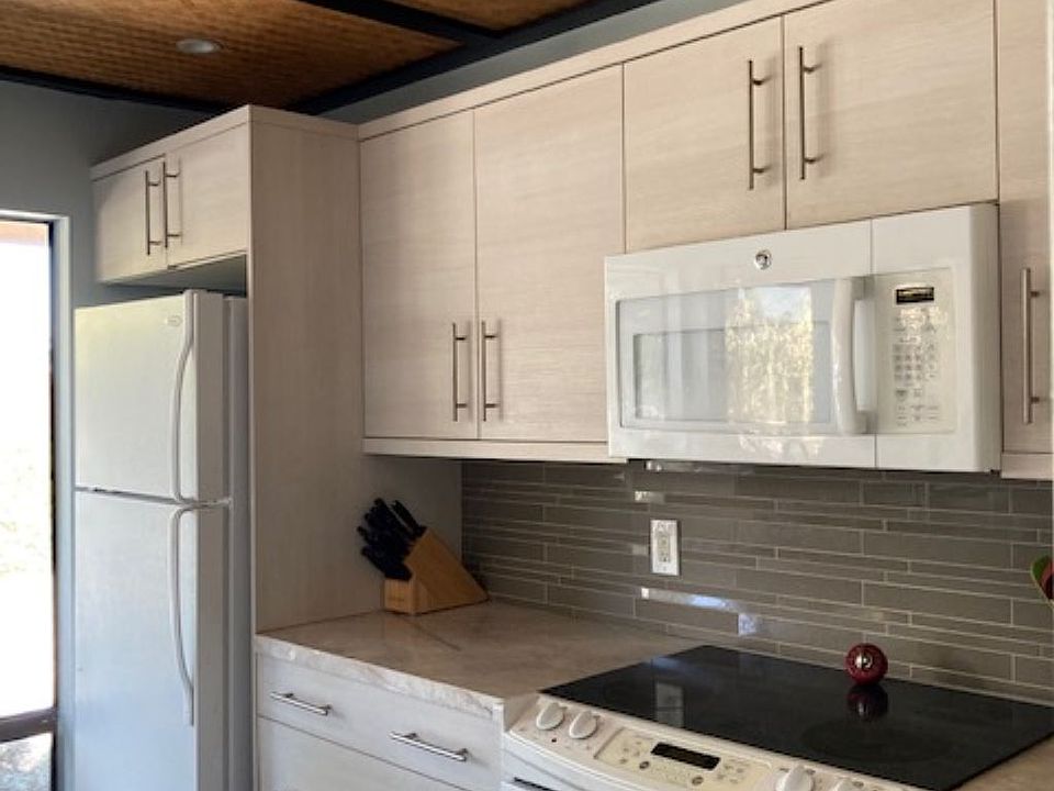 Kitchen with custom ceiling