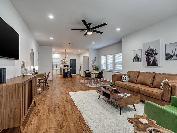 When you walk in you will see a cozy living space with a 55'' LG smart TV. You will have a seamless transition into the dining space, and large kitchen.