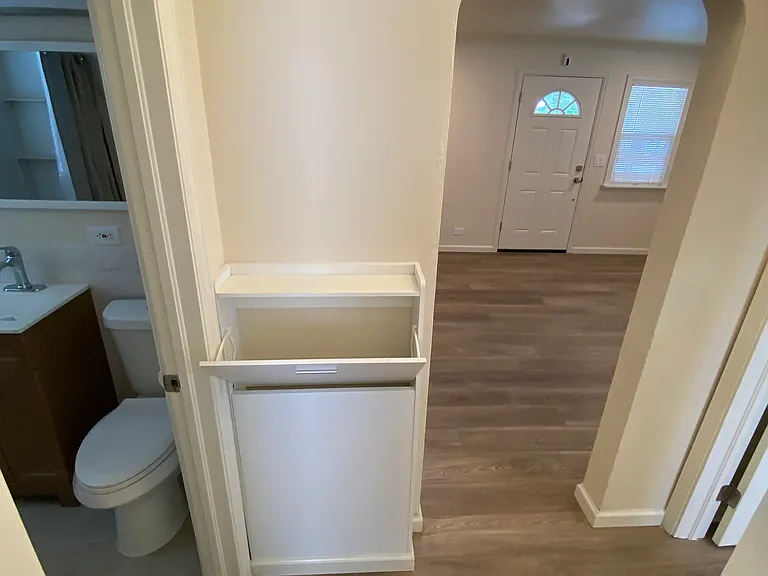 Laundry chute to basement laundry room.