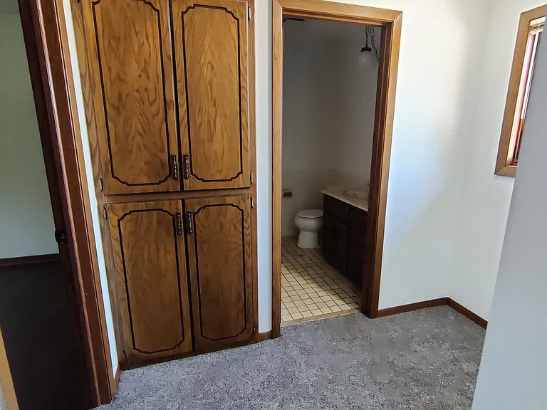 Hall closet and full bath upstairs.