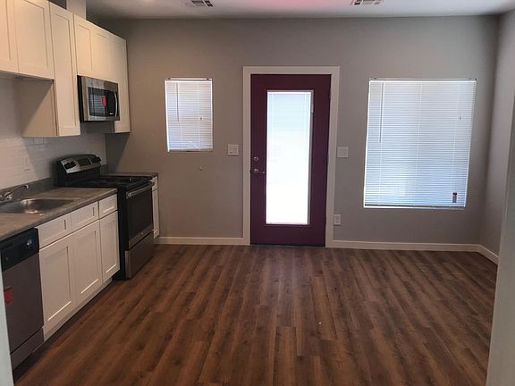 new wood flooring and dual pane windows