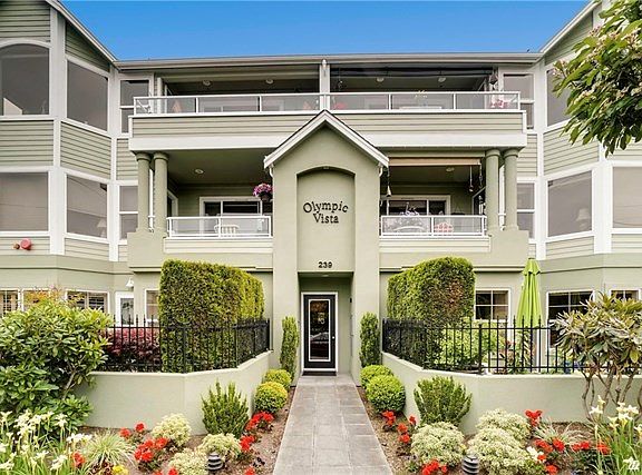 This ground floor condo is located on the left side of this picture with it's own private patio! Easy access to condo through secured entrance. No stairs!