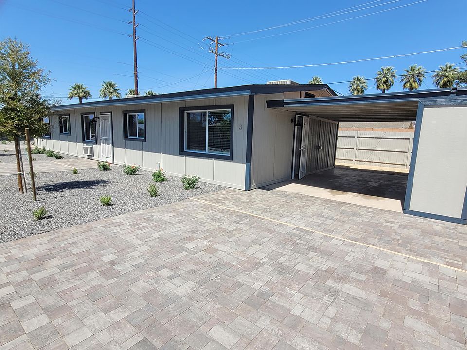 Carport attached next to the front door.