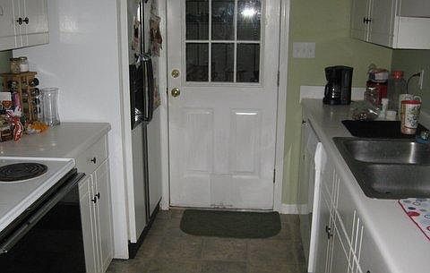 Kitchen opens to garage