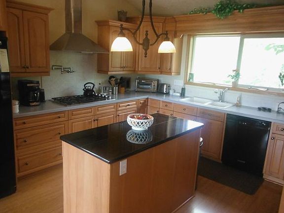 Gas stove w/faucet above