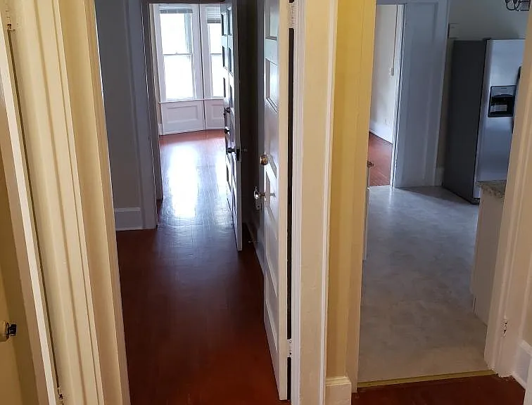 Hallway between bedrooms, bathroom and kitchen