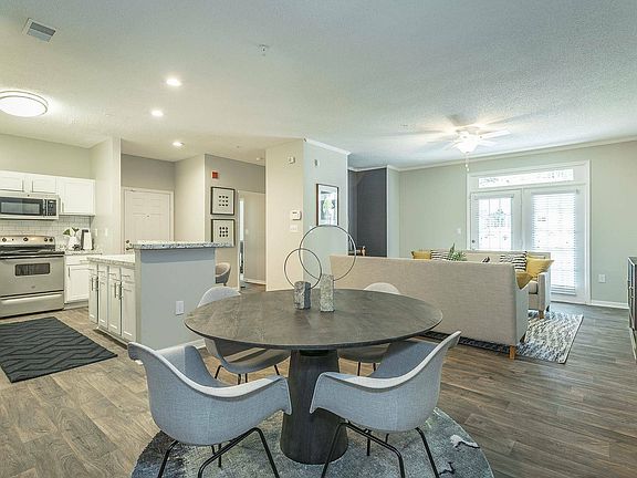 Experience contemporary dining in the beautifully designed dining room at Avenues of Kennesaw.