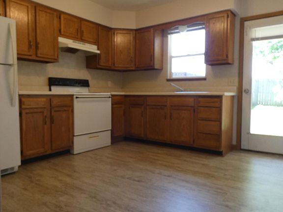 Bright kitchen with backyard access