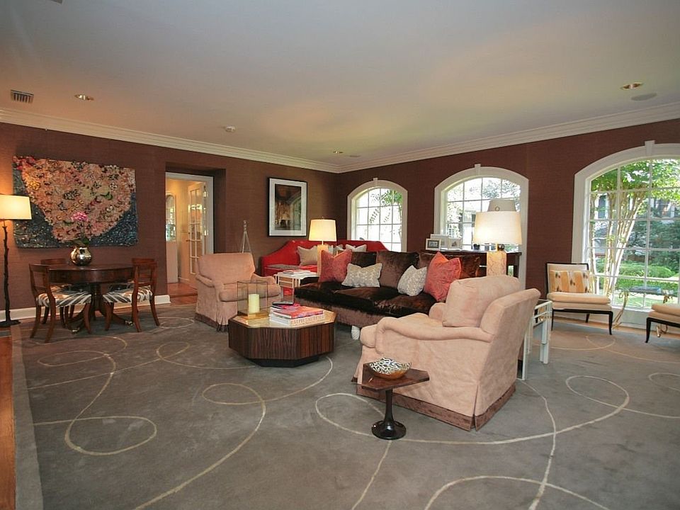 Dramatic Family Room with Arched Windows