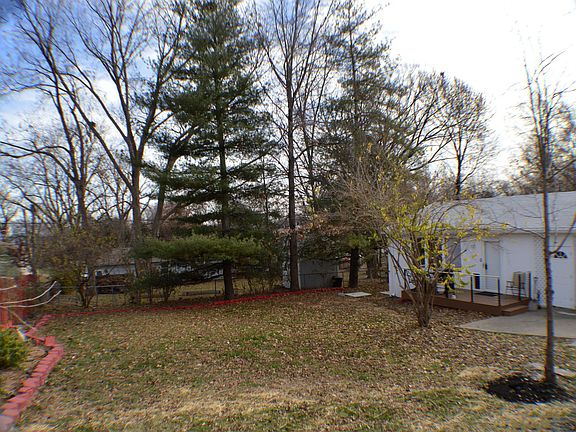 VIEW OF BACK YARD FROM MASTER BEDROOM AND KITCHEN