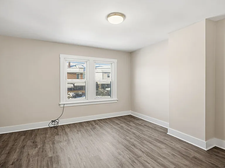 Charming Updated 2BR Home with New Flooring & Rear Porch — Photo 9
