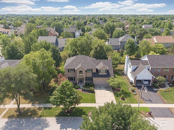 Gorgeous Curb Appeal with Mature Professionally Landscaped Gardens.