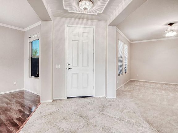Front Entry - Formal Living Room - Formal Dining Room