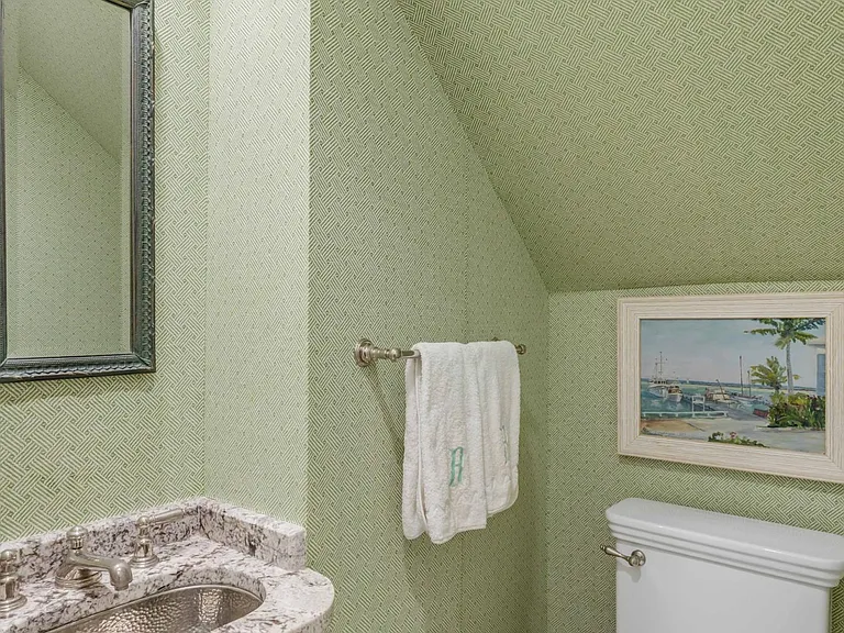Downstairs half bath ( foyer).