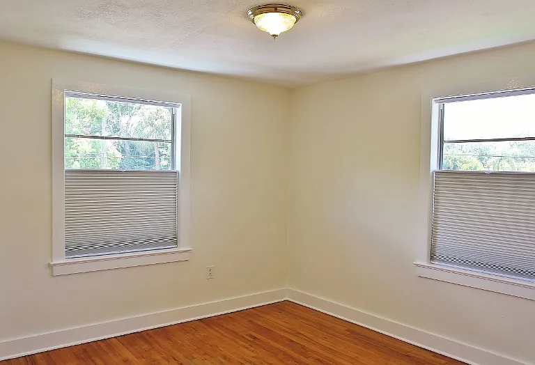 Master Bedroom Featuring "Blackout Blinds" And A "Remote Controlled Ceiling Fan/Light (just installed)" For Your Sleeping Comfort.