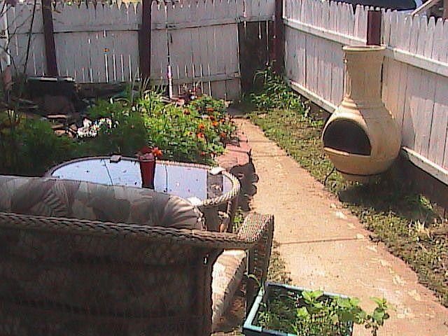 Relax in the sitting area by the pond.