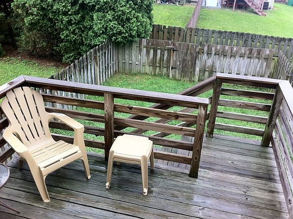 rear deck and fenced backyard