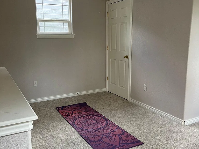 Upstairs landing and utility room; sunny spot for yoga, with full-size W/D unit provided.